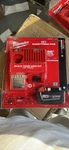 Milwaukee M18 Redlithium XC5.0 18V Battery And Charger Kit. Fixed Price $99.99.