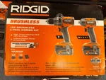 Ridgid 18V Brushless Hammer Drill & Impact Driver Combo Kit R92082 Li-ion. Fixed Price $249.00.