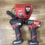 Milwaukee Fuel M12 Impact Boot/drill Set/ High Output Bat/bit Holder/charger. Fixed Price $250.00.