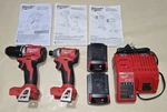 Milwaukee Cordless Combo Tool Kit Set With Two 2.0AH Batteries, And Charger. Fixed Price $250.00.