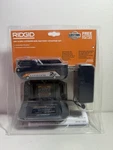 Ridgid 18V 2.0 Ah Lithium-ion Battery + Charger Starter Kit AC9302. Fixed Price $80.00.