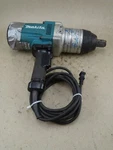Makita Electric Impact Runs, TW1000. Fixed Price $159.00.