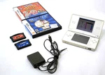 Nintendo Ds Lite Handheld W/ 4 Games - Quad Desert Fury Brain Age & More. Fixed Price $109.99.
