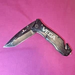 Vega Black Folding Pocketknife Stainless Steel Drop Point Blade Seatbelt Cutter. Fixed Price $16.25.