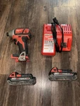 Milwaukee M18 Cordless Impact Driver Set, 2X 1.5AH Li-ion Batteries & Charger. Fixed Price $75.00.