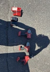 Milwaukee M18 Impact Driver, Drill, Saw Set, 2 Li-ion Batteries, Charger, Red. Fixed Price $600.00.
