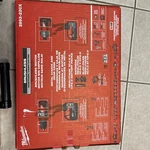 New Milwaukee 2893-22CX M18 Brushless Hammer Drill & Impact Combo Kit. Fixed Price $300.00.